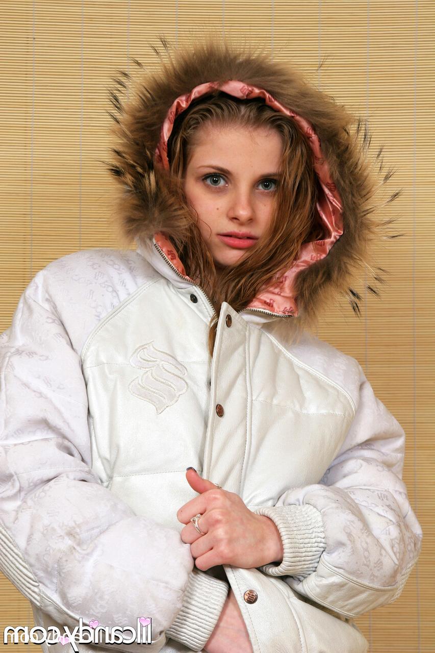 15P Skinny babe Lil Candy shows her tiny boobs while posing in her winter jacket