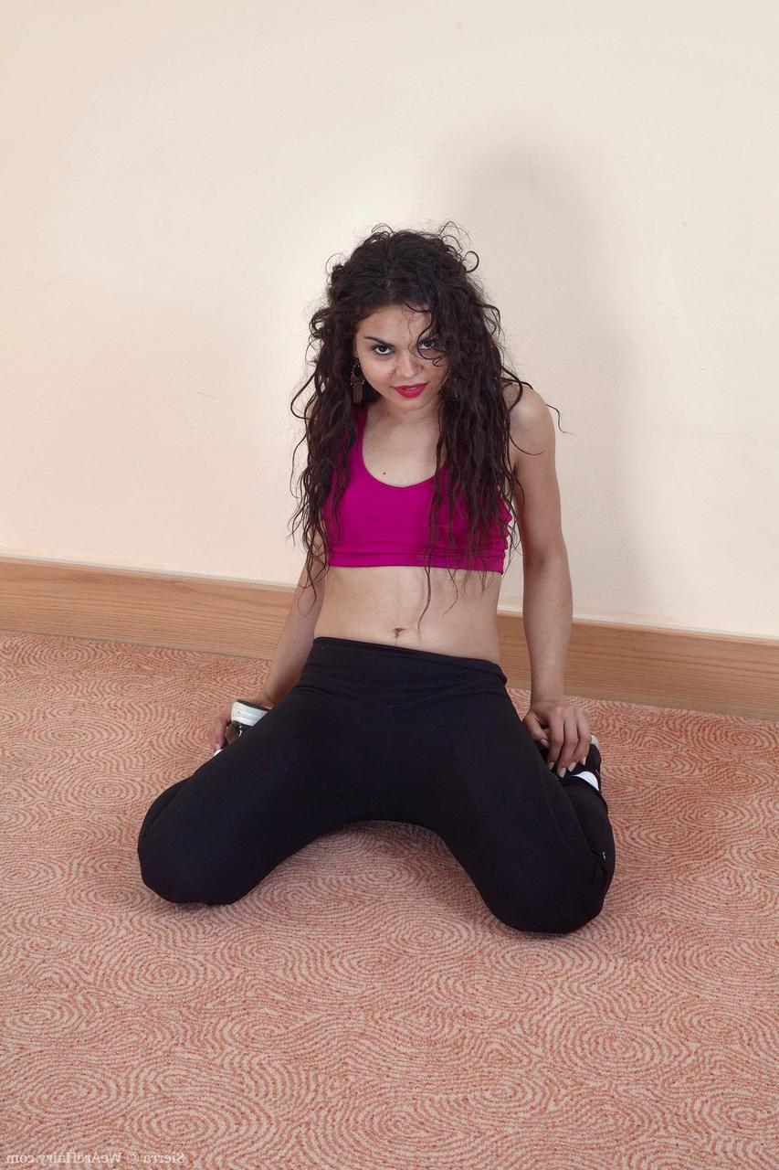 17P Brunette hottie in workout clothes Sierra spreads her tight and hairy vagina