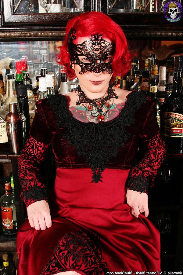 15P Tattooed redhead Zelda gets naked while wearing a masquerade mask