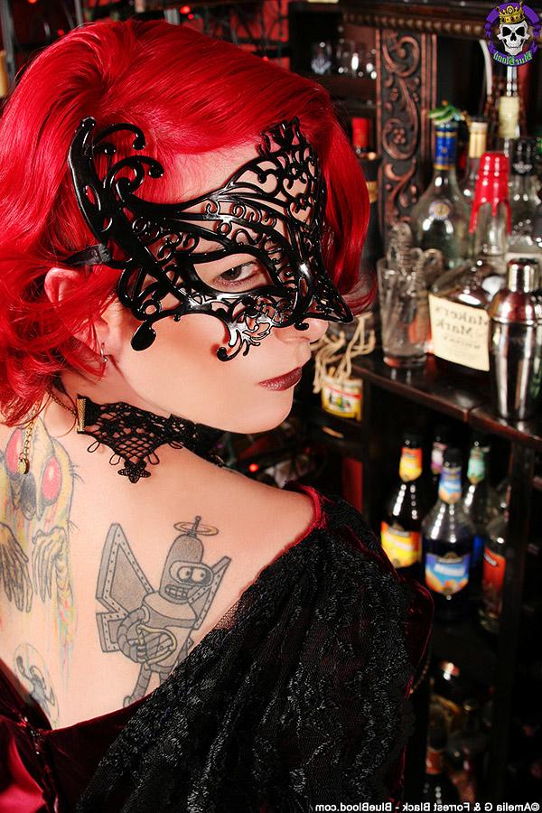 15P Tattooed redhead Zelda gets naked while wearing a masquerade mask