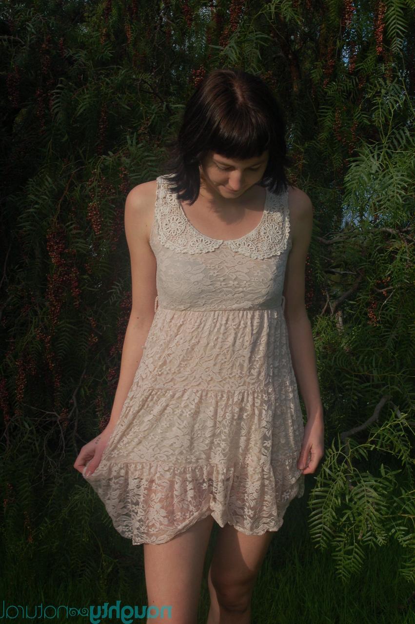 20P Short brunette Coral Aorta undressing and playing with her long pussy hair