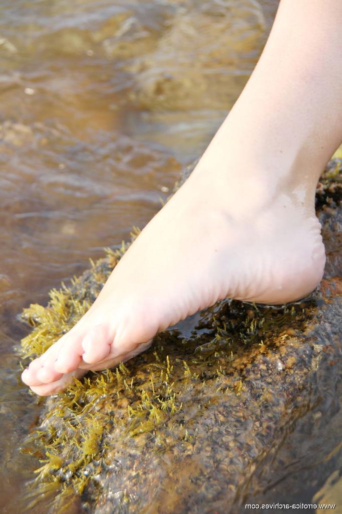 16P Cute blonde teen Garcia goes totally naked on rocks in the ocean
