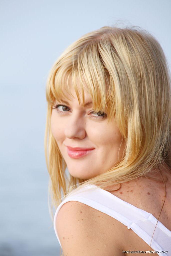 16P Cute blonde teen Garcia goes totally naked on rocks in the ocean