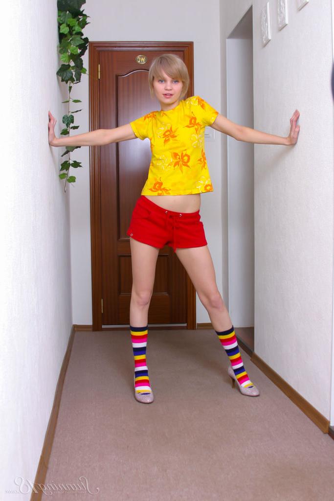16P Cute 18 year old Lily L sports short blonde hair while getting naked in socks