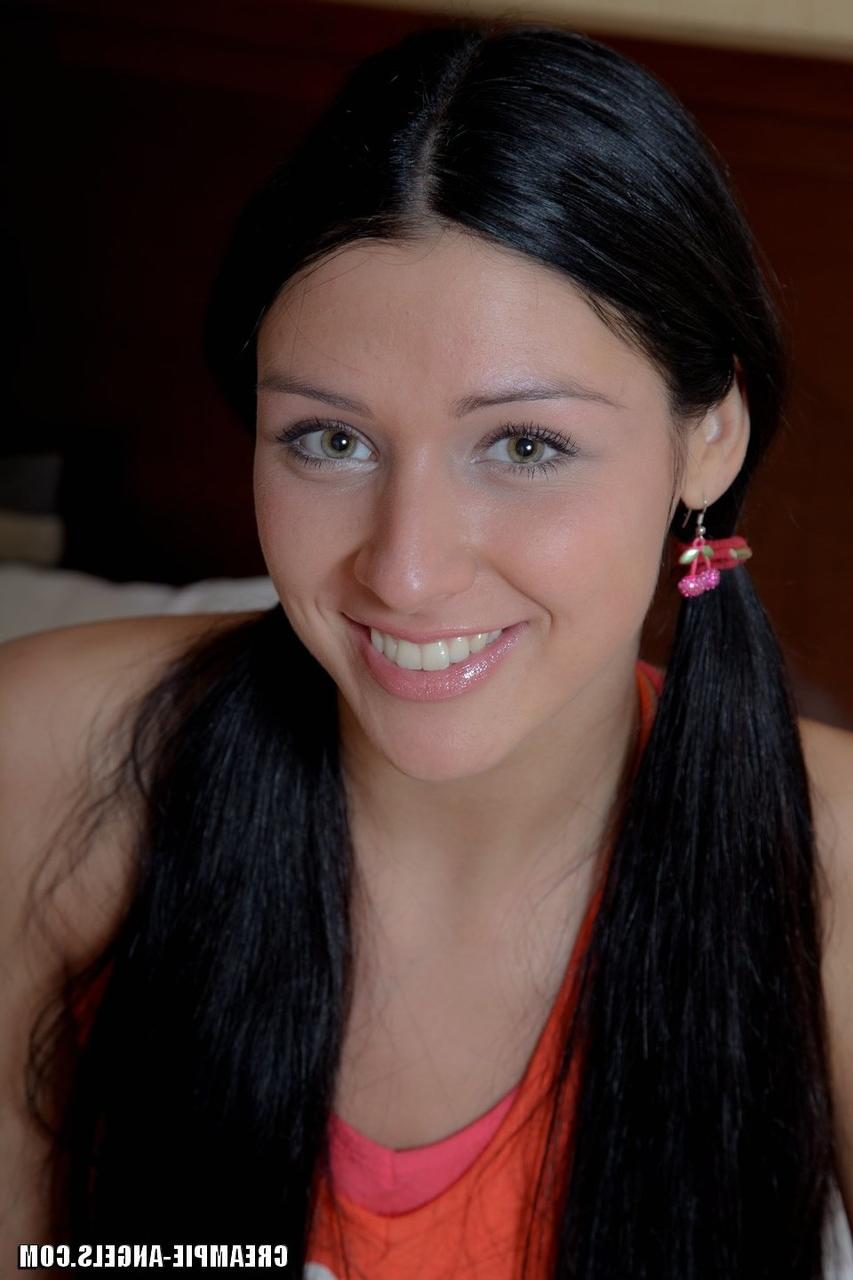 14P Dark haired teen Elizabeth blows a long penis prior to anal sex in pigtails