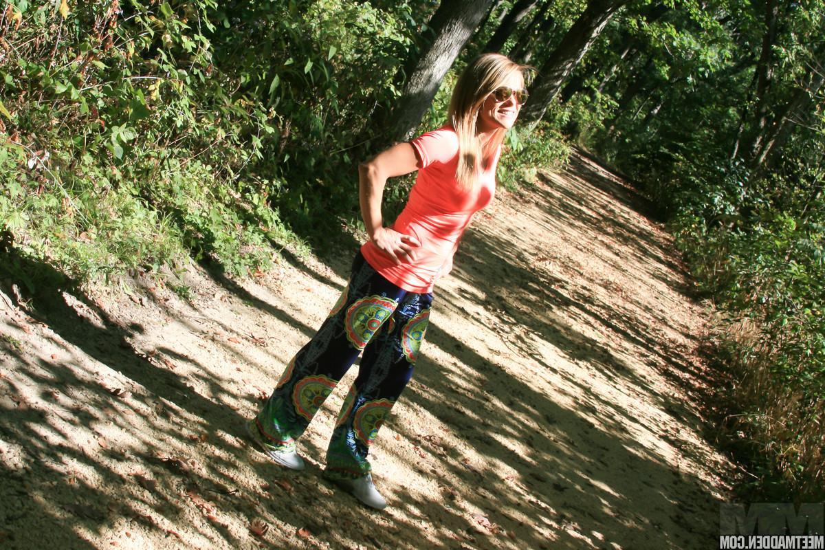 15P Amateur blonde MILF Madden stripping to her sexy underwear in the woods