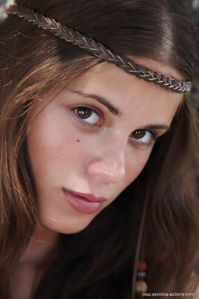 16P Teen hippy Caprice climbs a tree in the yard while completely naked