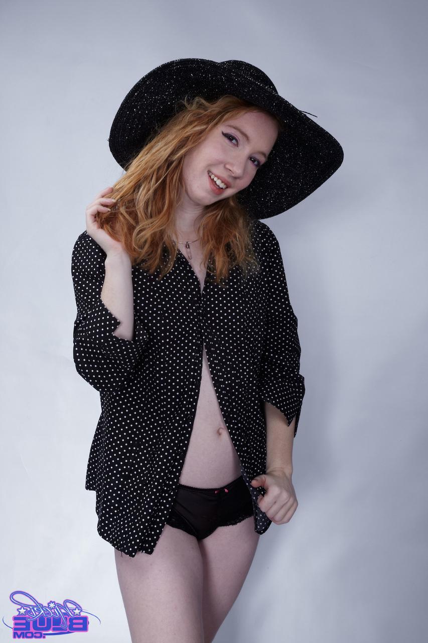 20P Petite Nicki Blue flaunts her natural tits in a big black hat & sexy panties