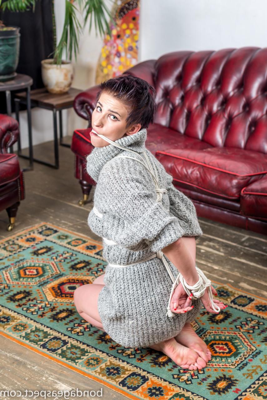 12P White girl Claudia is gagged and bound while wearing a sweater dress