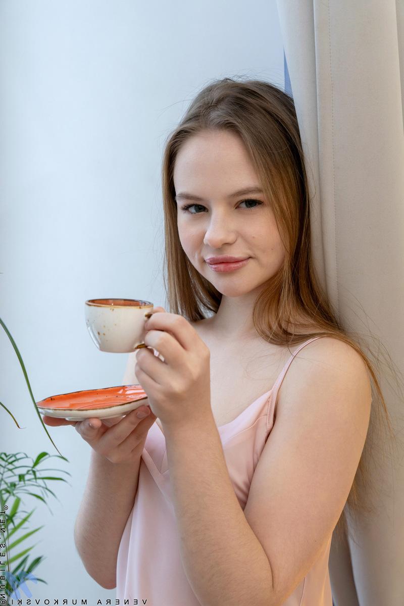 16P Sweet teen Venera Murkovski plays with her hairless pussy after getting naked