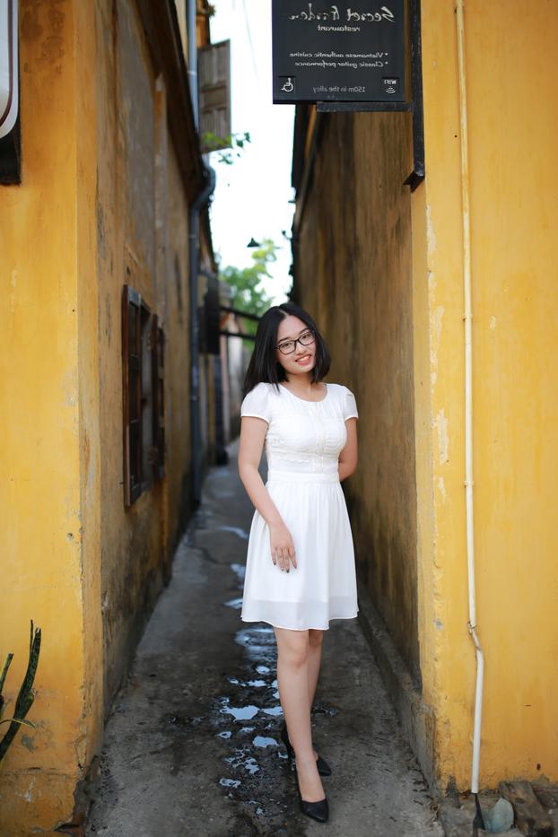 20P Cute Asian girl with eyeglasses posing in her lovely white dress in public