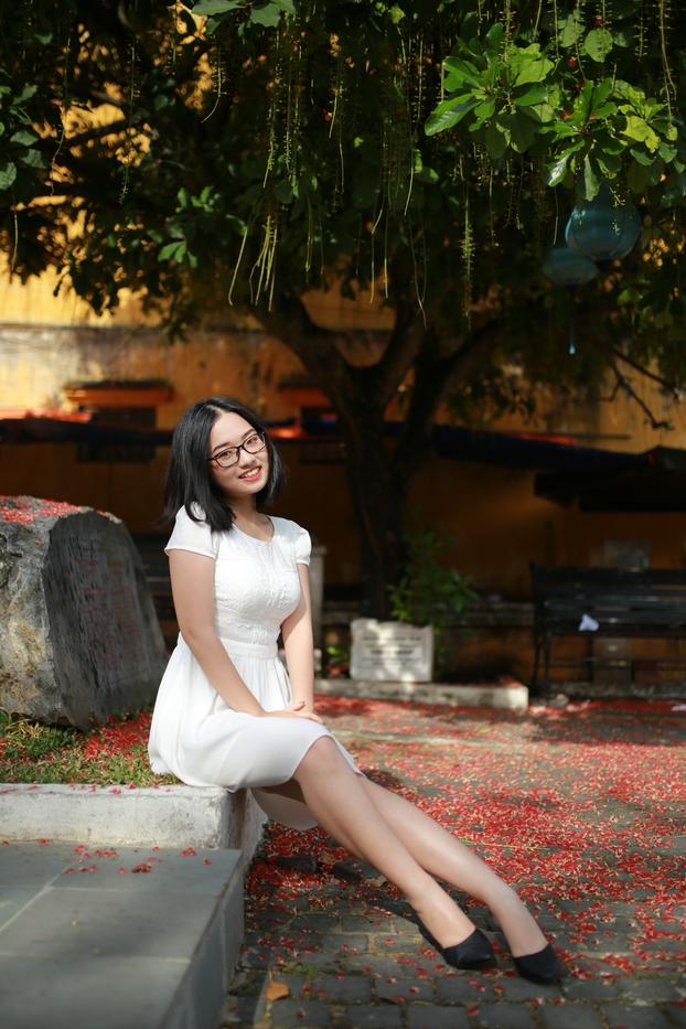 20P Cute Asian girl with eyeglasses posing in her lovely white dress in public