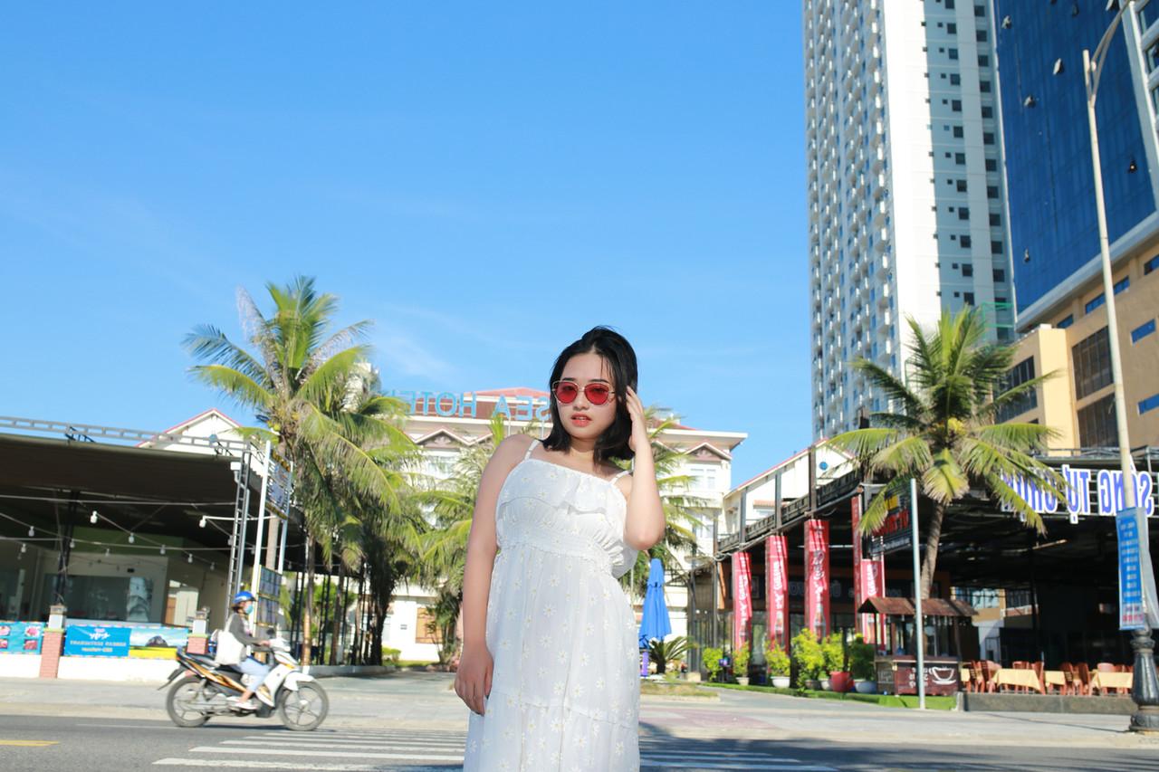 20P Cute Asian girl with eyeglasses posing in her lovely white dress in public