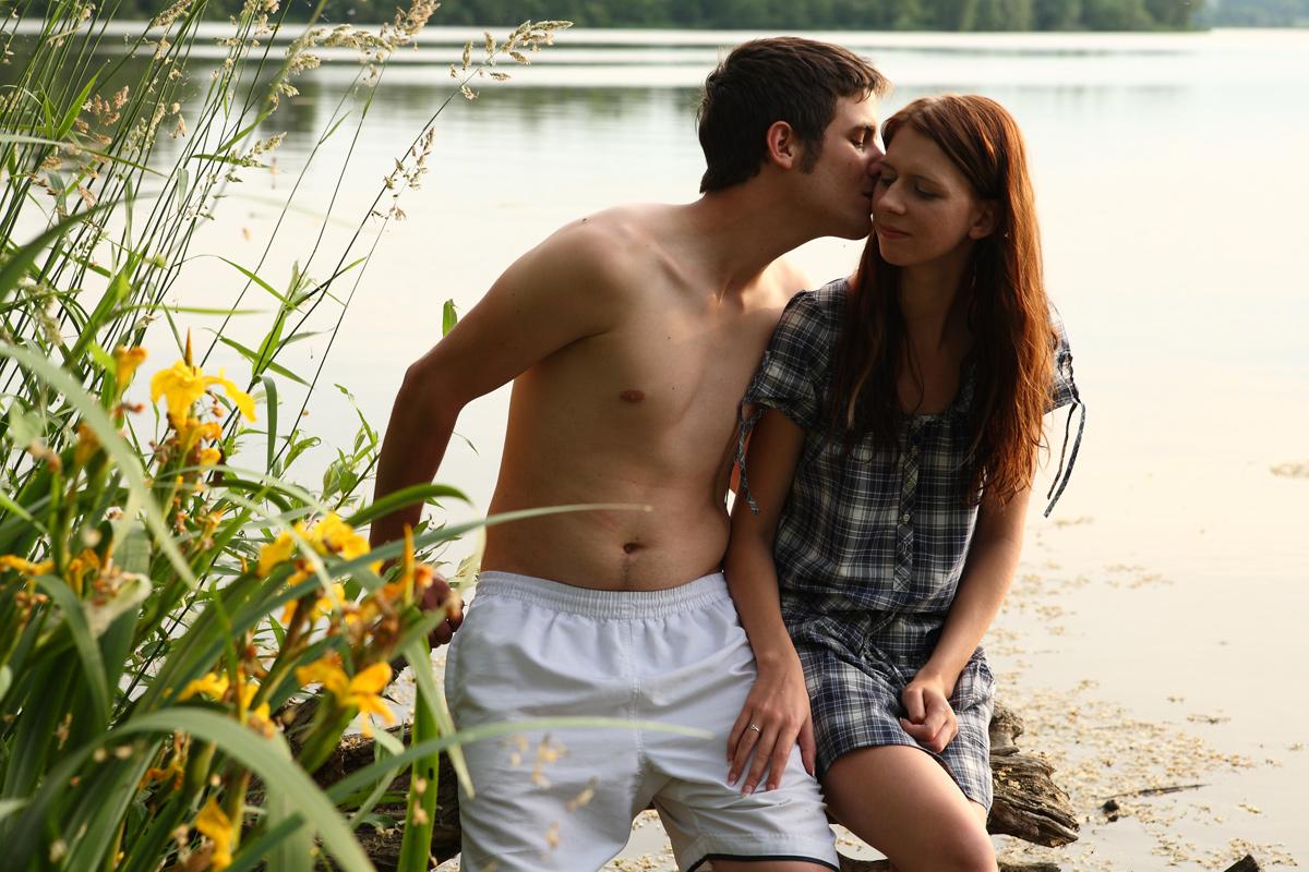 20P Young couple wade into a body of water before getting naked to fuck