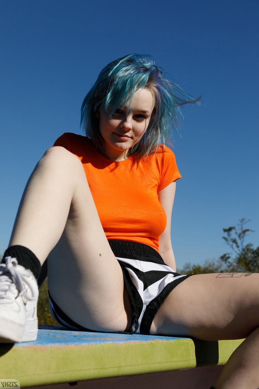 12P Sweet teen Vonnie Bean teases with her underboobs and big ass outdoors
