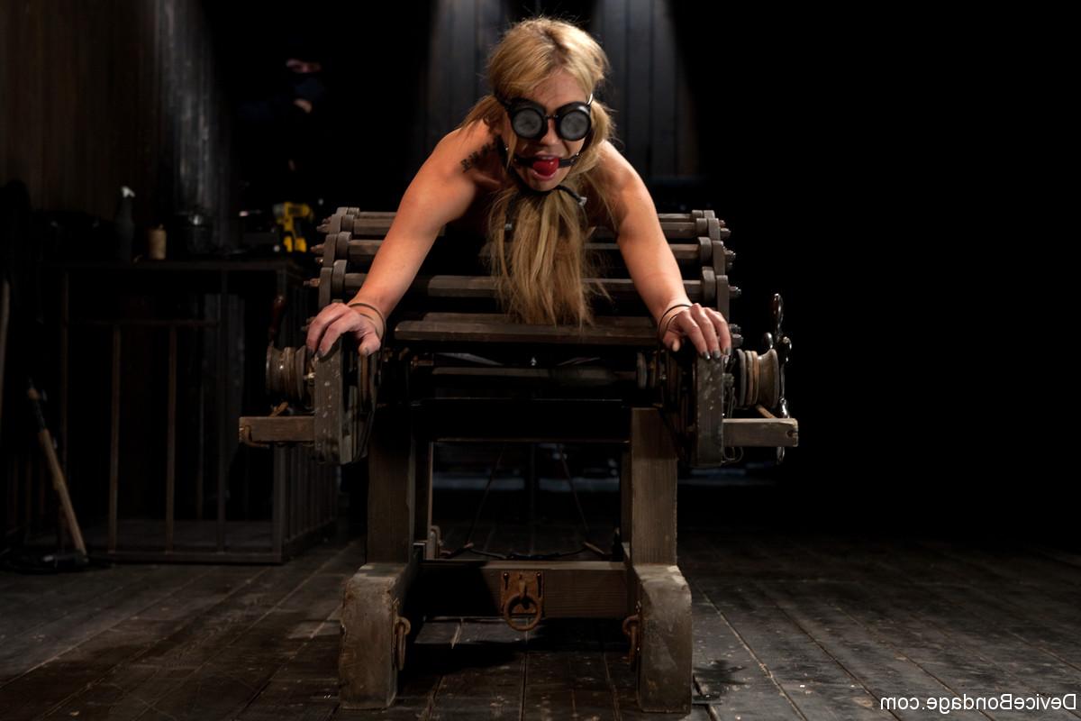 20P Blindfolded Amy Brooke gets toyed while bound to a wooden BDSM arch