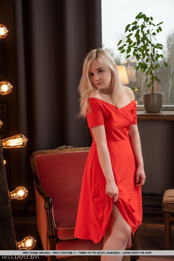18P Young blonde Riya doffs a red dress for a nude modelling appearance