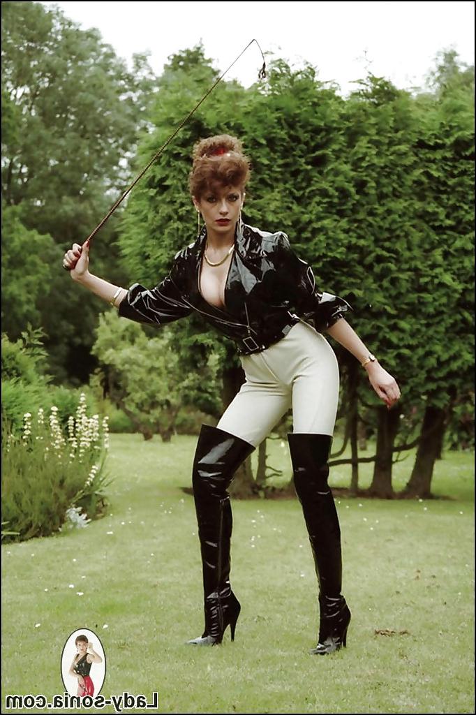 15P Tempting fetish lady posing in sexy horse jokey outfit outdoor