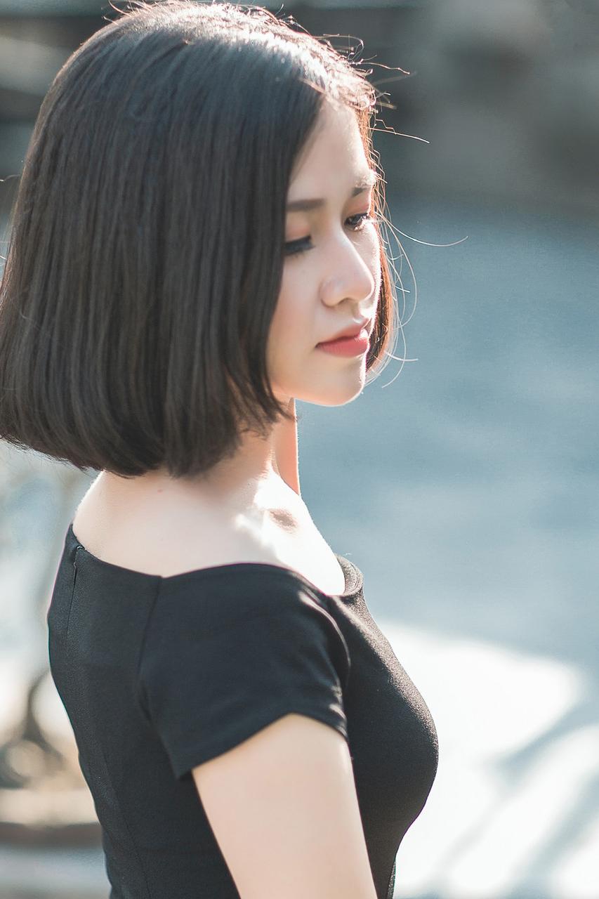 20P Glamorous Asian babe posing in her elegant black dress in public