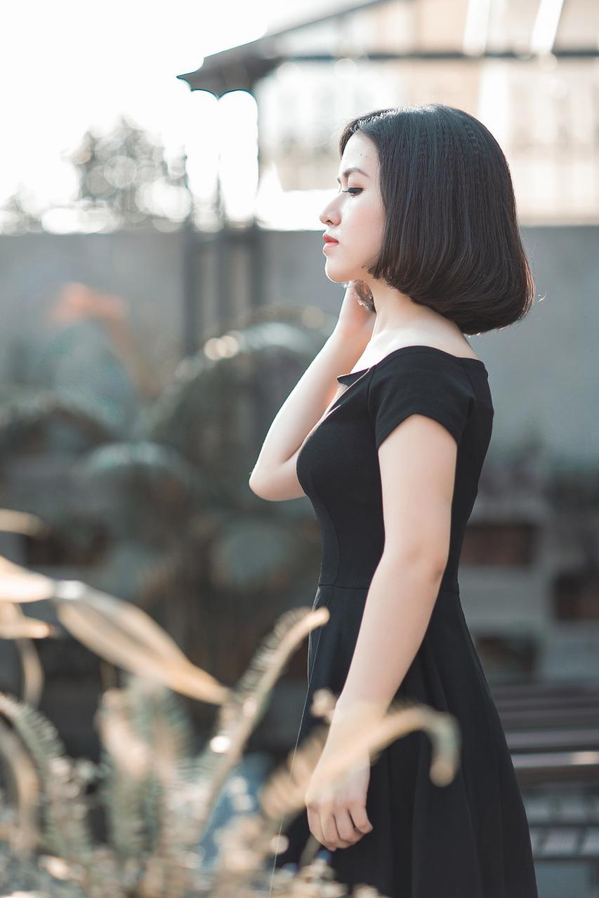 20P Glamorous Asian babe posing in her elegant black dress in public