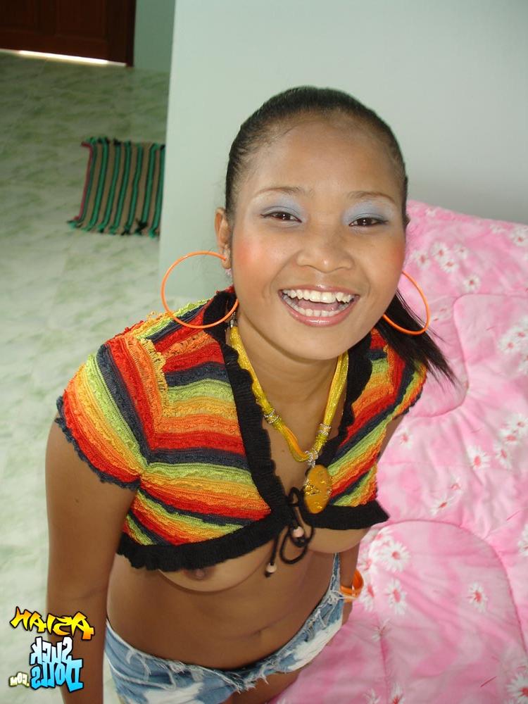 19P Charming Thai babe A unveils her juicy tits and strips to her panties