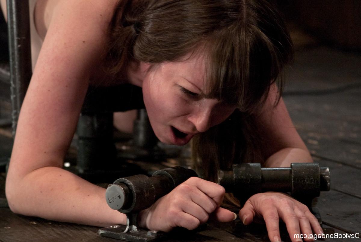 17P Brunette girl is machine fucked during metal bondage scene with her handler
