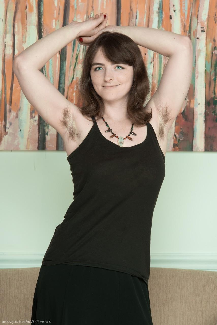 20P Pale skinned brunette Snow removes black dress and spreads her hairy bush wide