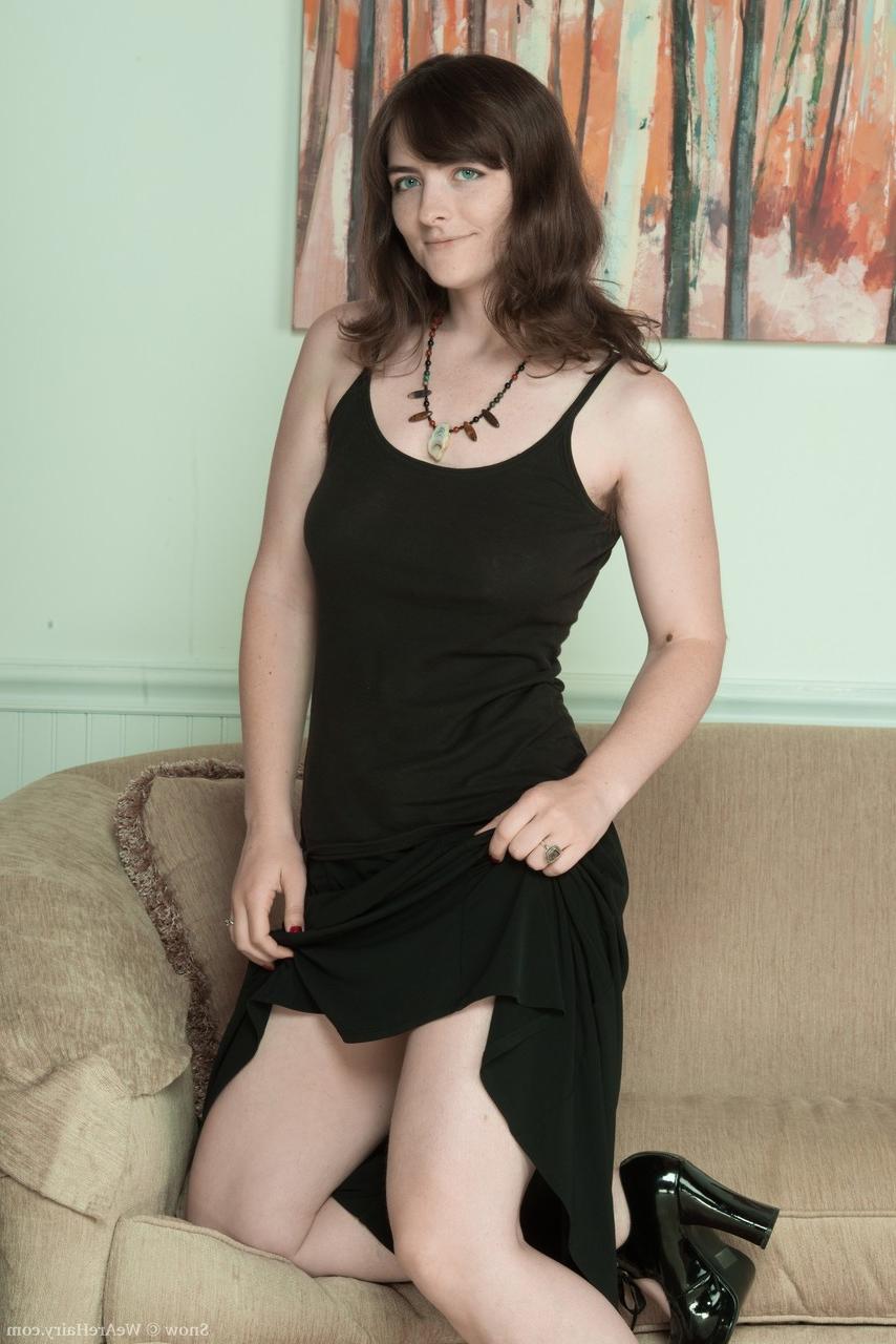 20P Pale skinned brunette Snow removes black dress and spreads her hairy bush wide