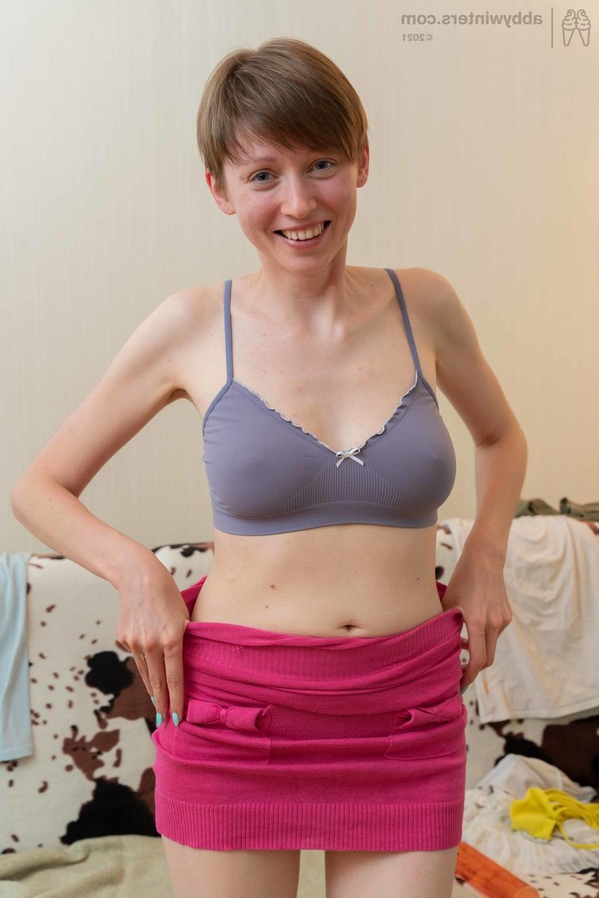 20P Short haired amateur Erina flaunts her skinny legs and nice natural tits