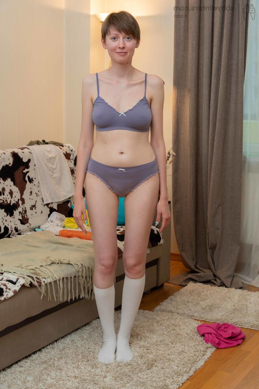 20P Short haired amateur Erina flaunts her skinny legs and nice natural tits