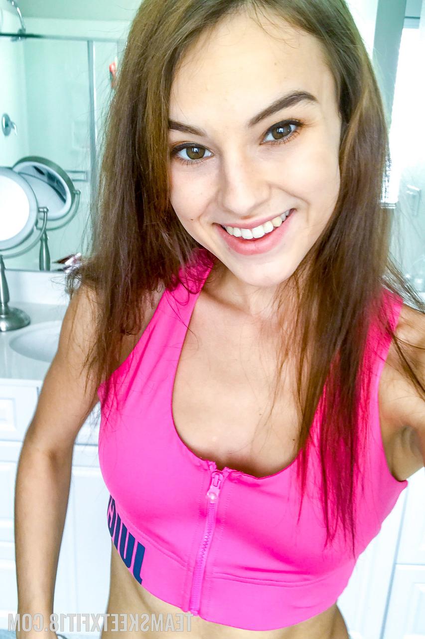 20P Lovely teen Ellie Eilish shows her beautiful tits and her shaved pussy