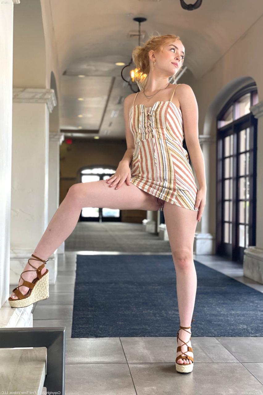 20P Glamour babe Maria flashes an arousing upskirt in a sexy dress & heels