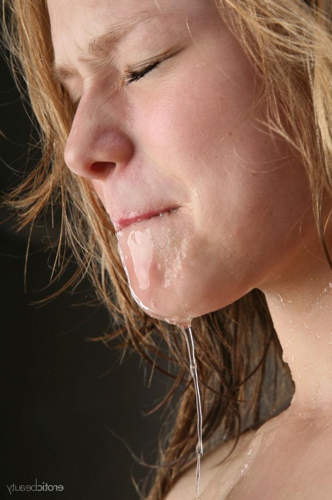 16P Totally naked teen Mia C wets her nubile body while in the shower