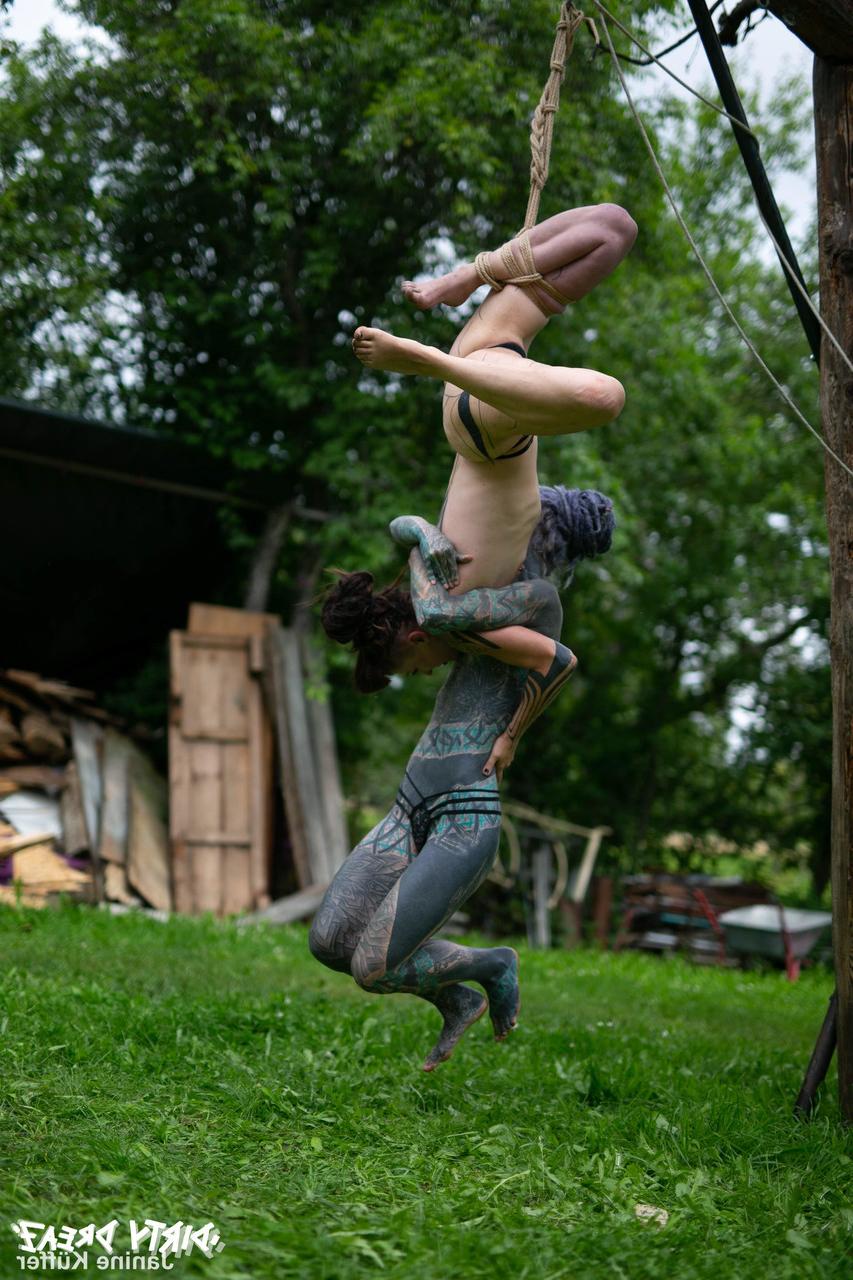 16P Naked girls are suspended from a backyard tree with block and tackle