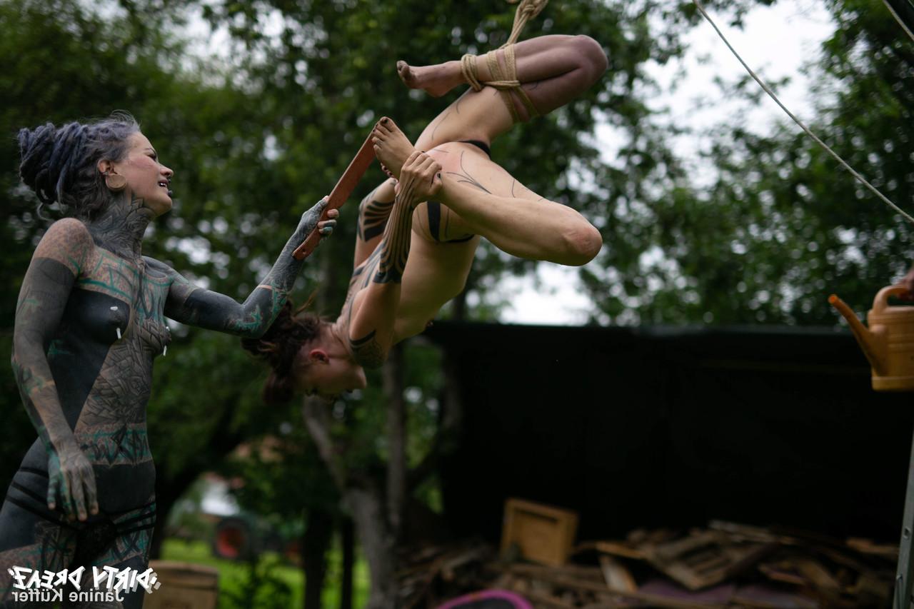 16P Naked girls are suspended from a backyard tree with block and tackle