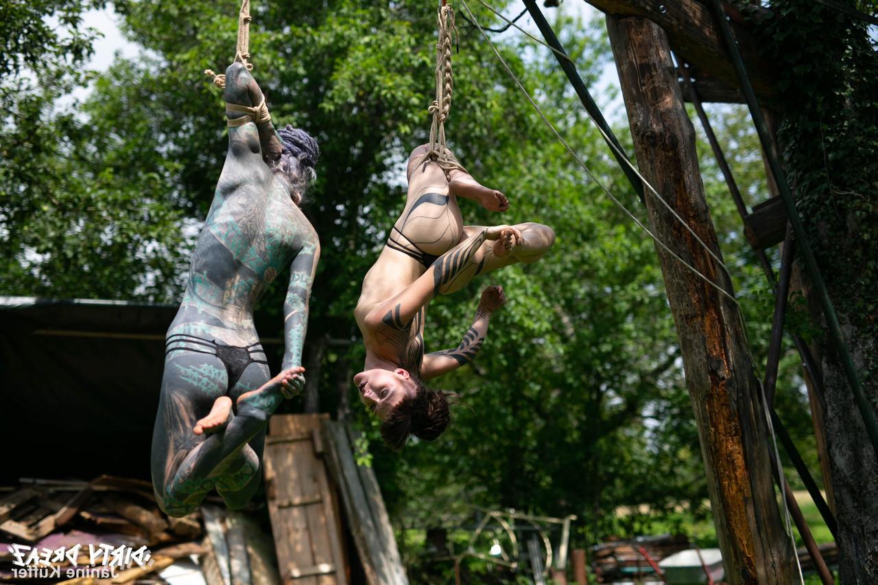 16P Naked girls are suspended from a backyard tree with block and tackle