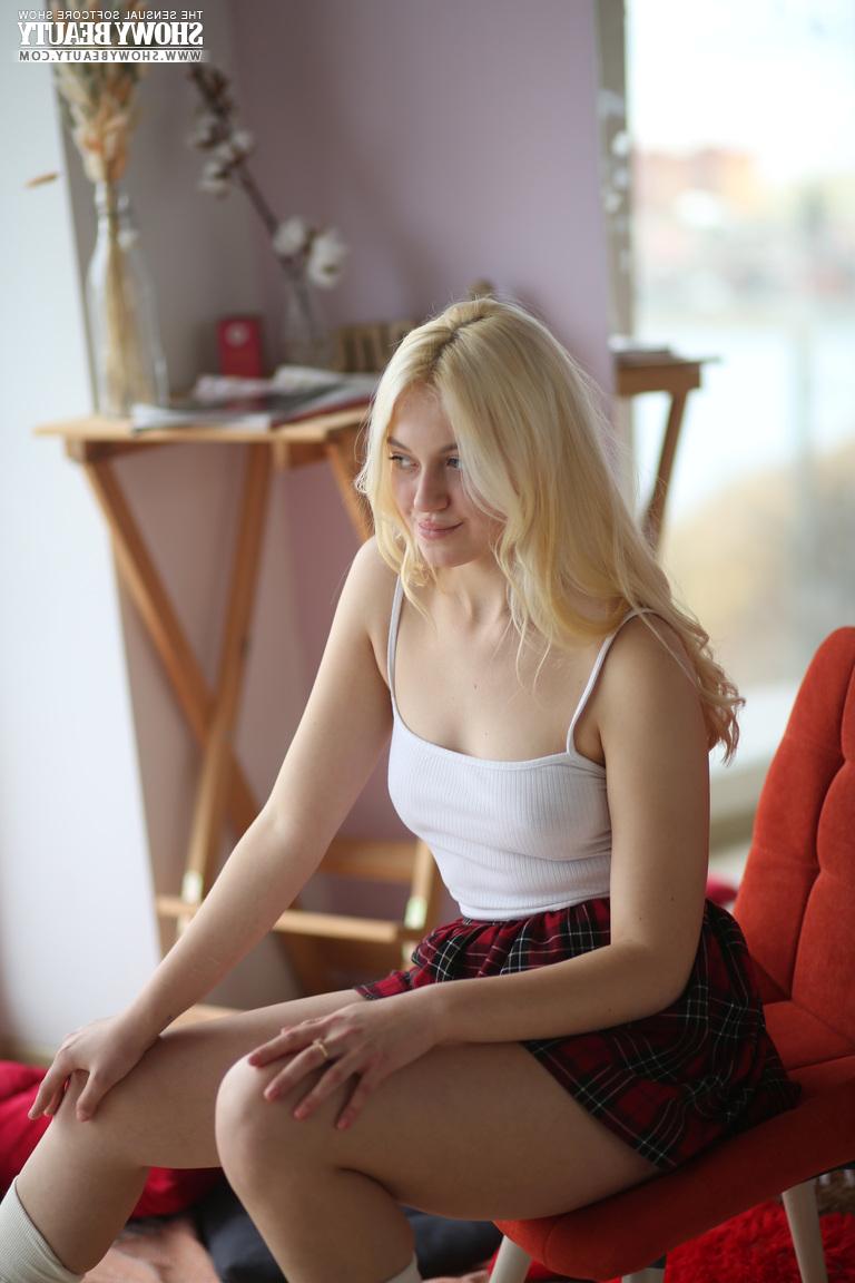 20P Beautiful blonde teen Blondy removes rollerskates while going nude at Xmas