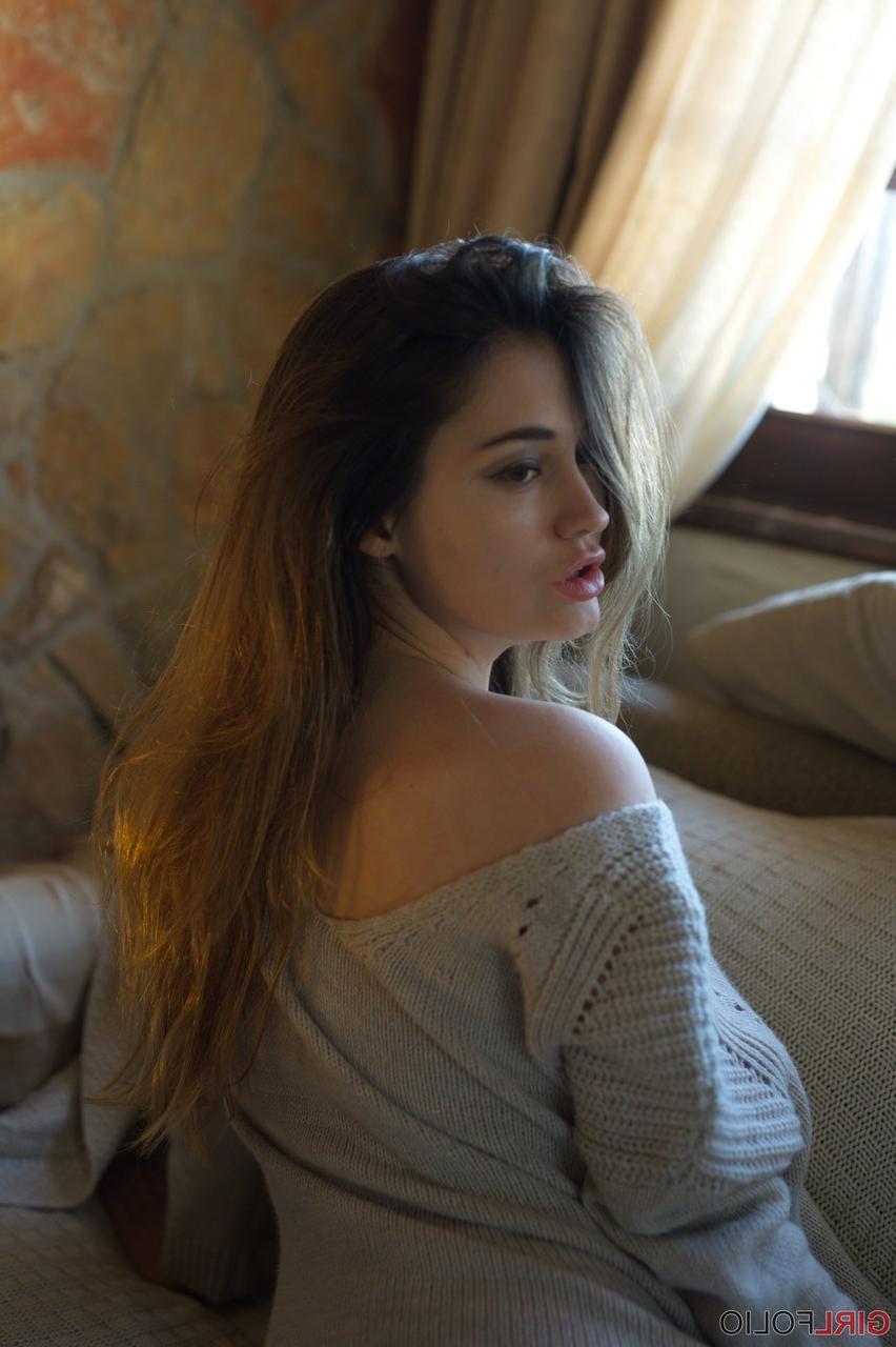12P Glamour girl Gabriella Knight frees big naturals from sweater in OTK socks