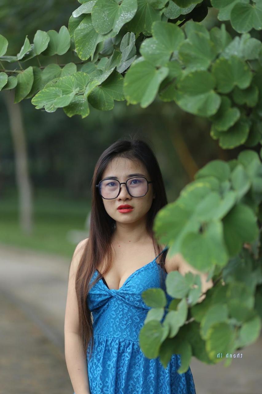 20P Gorgeous Asian model Elena posing in her cute blue dress in public