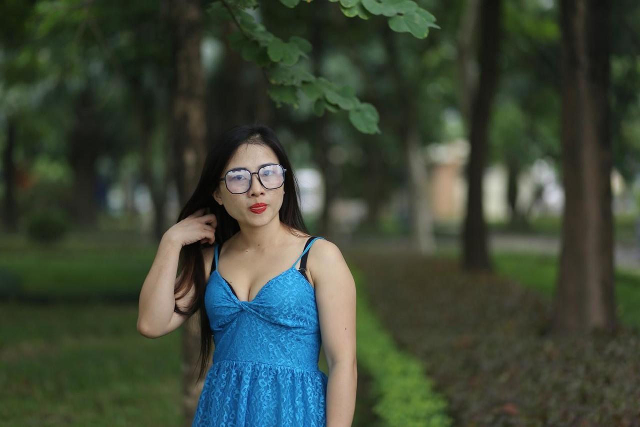 20P Gorgeous Asian model Elena posing in her cute blue dress in public