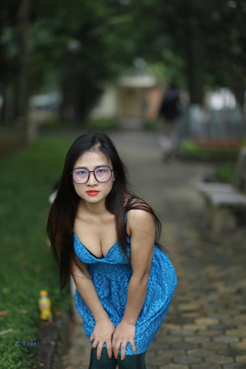 20P Gorgeous Asian model Elena posing in her cute blue dress in public