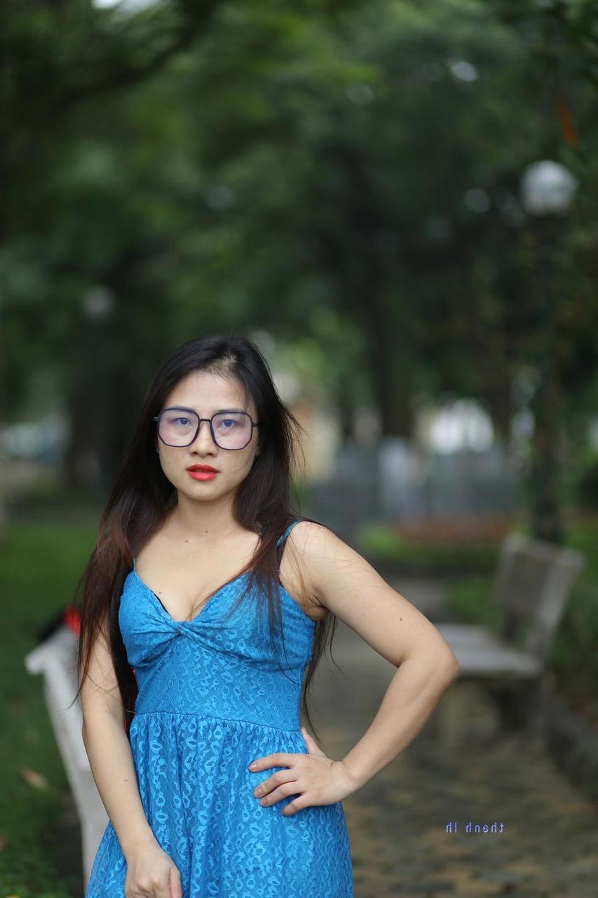 20P Gorgeous Asian model Elena posing in her cute blue dress in public