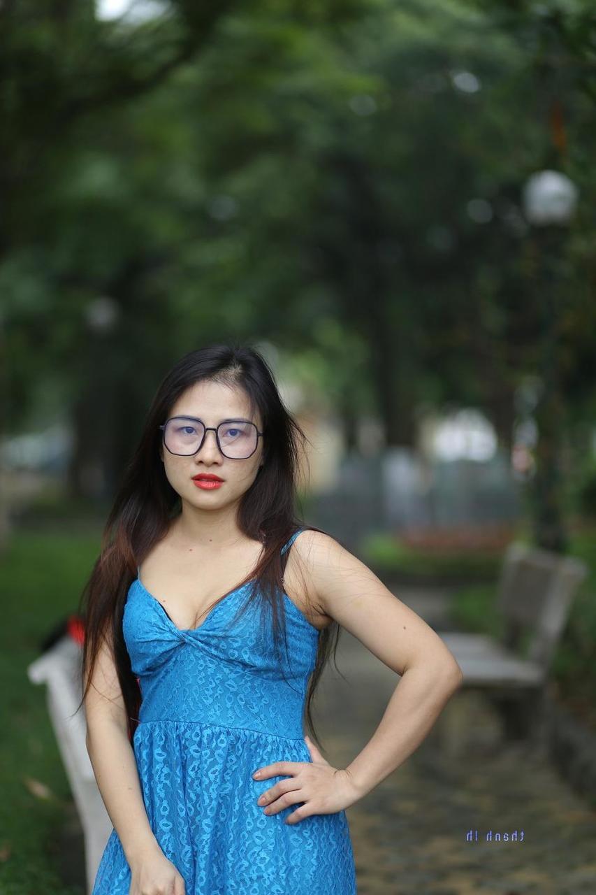 20P Gorgeous Asian model Elena posing in her cute blue dress in public
