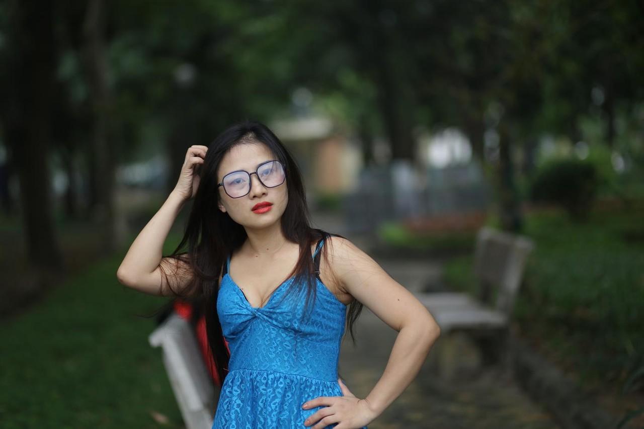 20P Gorgeous Asian model Elena posing in her cute blue dress in public
