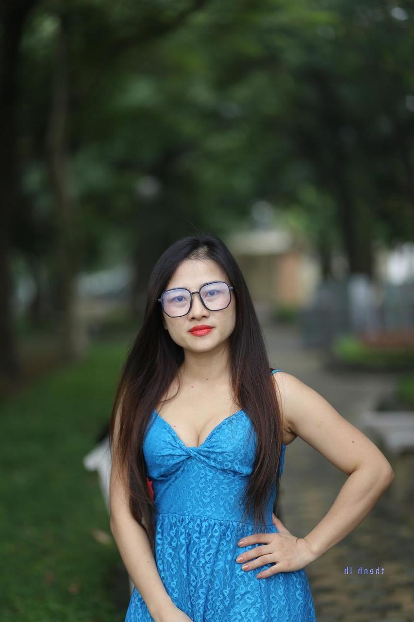 20P Gorgeous Asian model Elena posing in her cute blue dress in public
