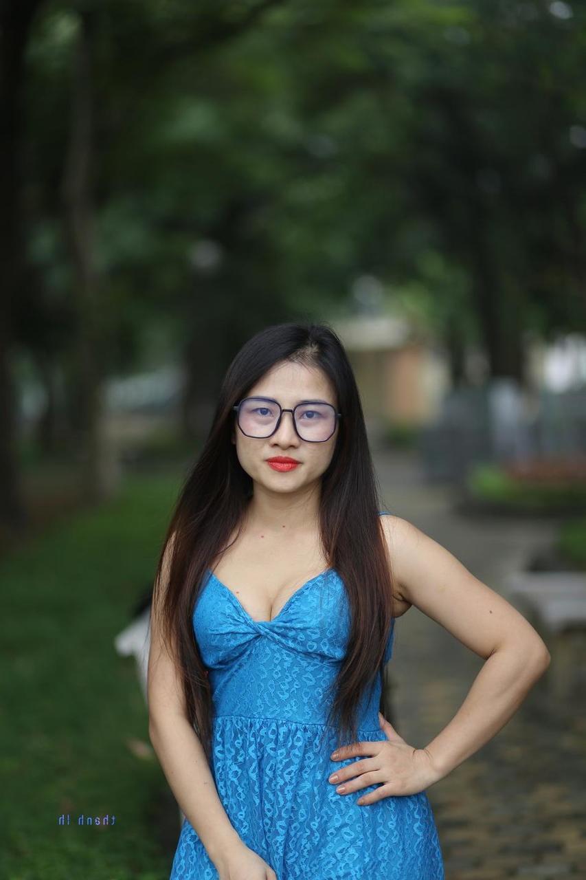 20P Gorgeous Asian model Elena posing in her cute blue dress in public