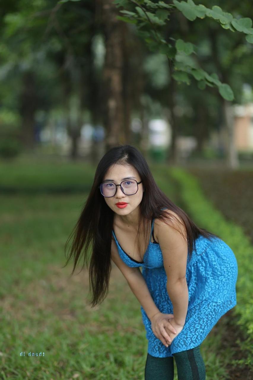 20P Gorgeous Asian model Elena posing in her cute blue dress in public
