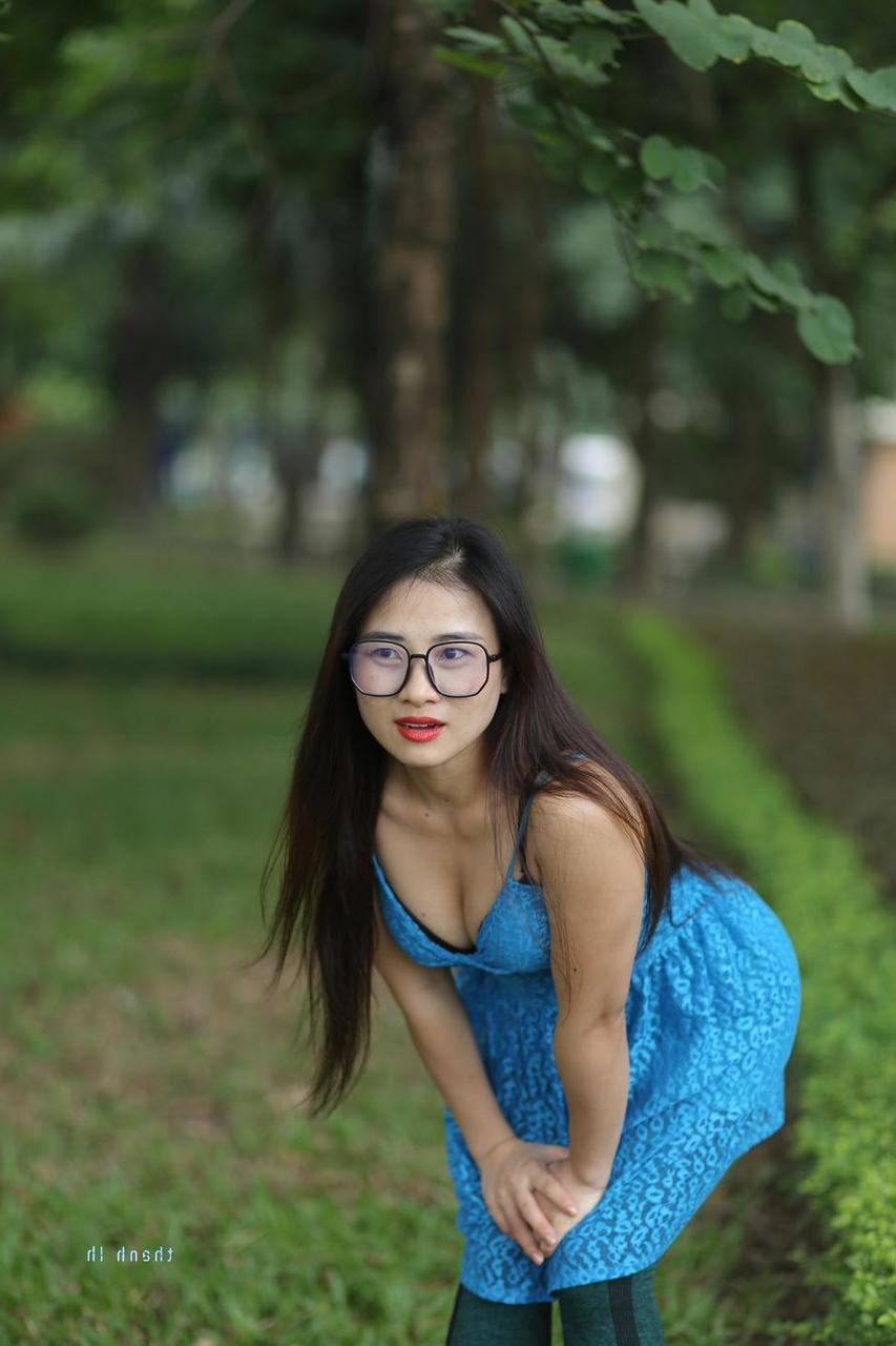 20P Gorgeous Asian model Elena posing in her cute blue dress in public