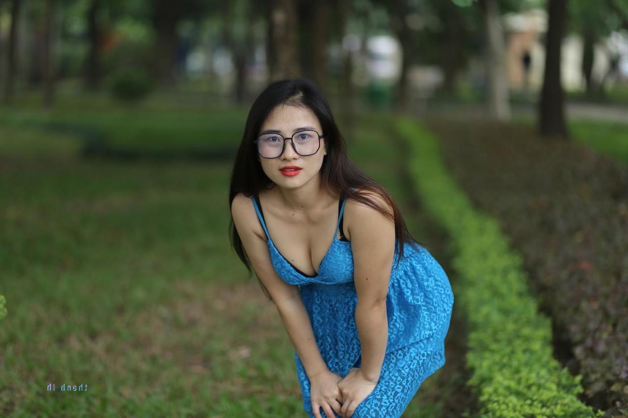 20P Gorgeous Asian model Elena posing in her cute blue dress in public