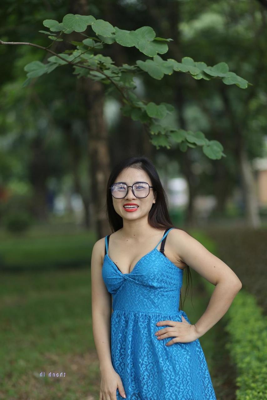 20P Gorgeous Asian model Elena posing in her cute blue dress in public